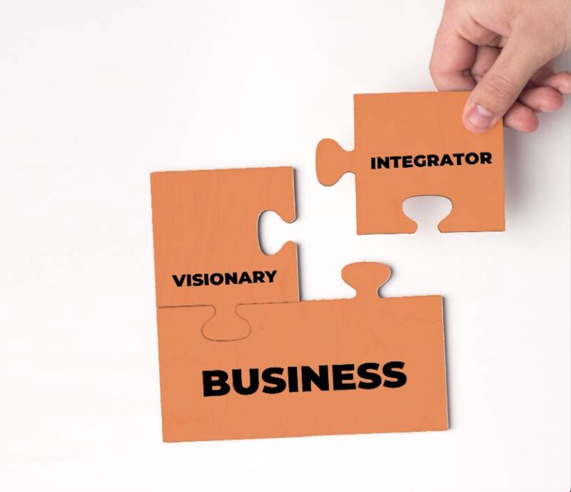 Puzzle pieces labeled Visionary and Integrator completing the Business piece