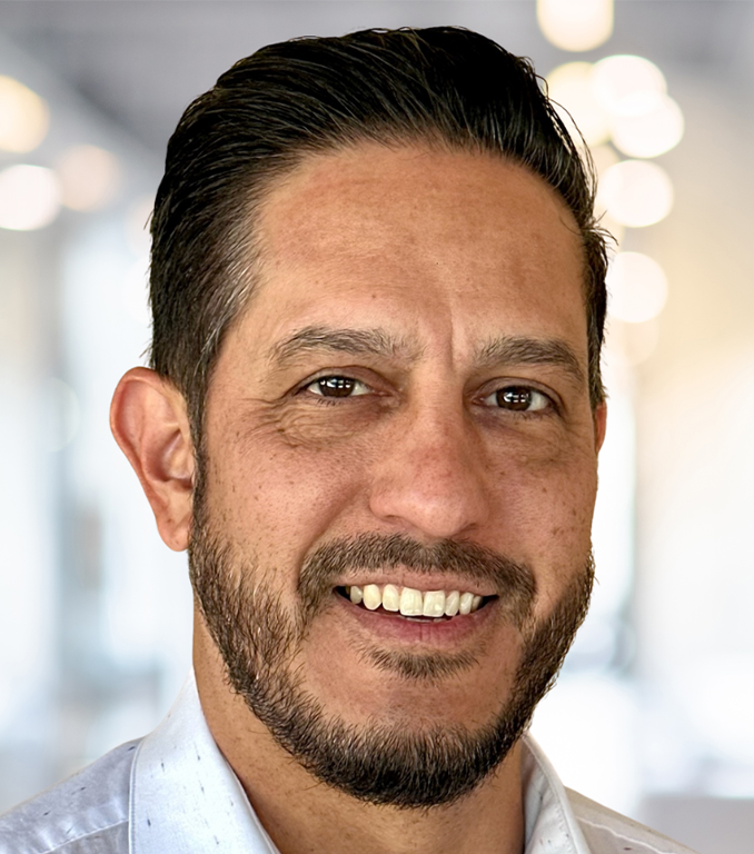 Headshot of Michael Vasquez, CEO at Olinger, sharing their experience working with Alignment Worx